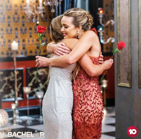 Abbie Chatfield and Chelsie McLeod embrace after the final rose ceremony on The Bachelor Australia 2019.