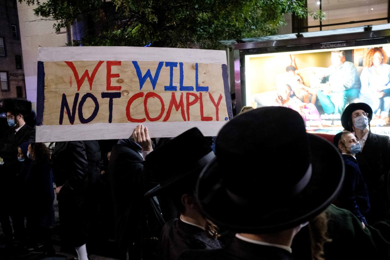 Ultra-Orthodox Jews gather in Borough Park in New York to protest Covid-19 restrictions (REUTERS)