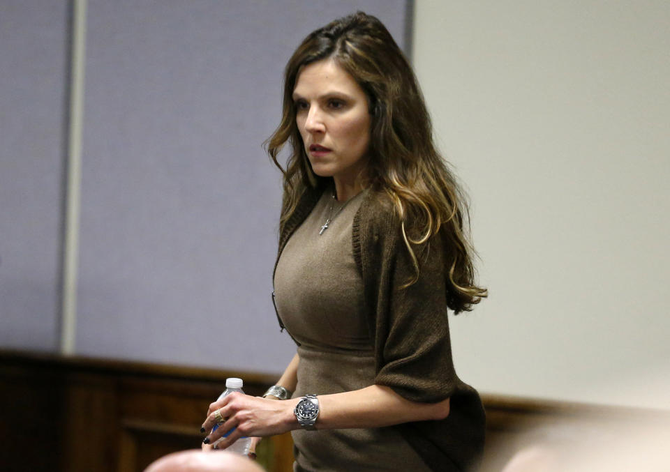 STEPHENVILLE, TX - FEBRUARY 11: Taya Kyle, wife of slain Navy SEAL Chris Kyle, arrives for the opening day of the capital murder trial of former Marine Cpl. Eddie Ray Routh at the Erath County Donald R. Jones Justice Center on February 11, 2015 in Stephenville, Texas.  Eddie Ray Routh, 27, of Lancaster is charged with the 2013 deaths of former Navy SEAL Chris Kyle and his friend Chad Littlefield at a shooting range near Glen Rose, Texas. (Photo by Tom Fox-Pool/Getty Images)