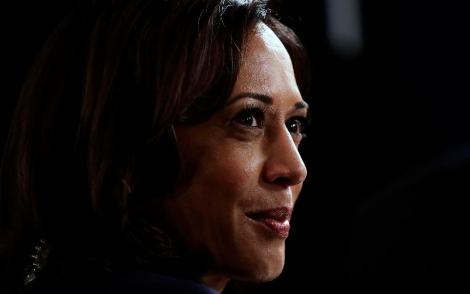 In this Sept. 12, 2019, file photo Sen. Kamala Harris, D-Calif., talks to the media in the spin room following the Democratic presidential primary debate hosted by ABC on the campus of Texas Southern University in Houston.