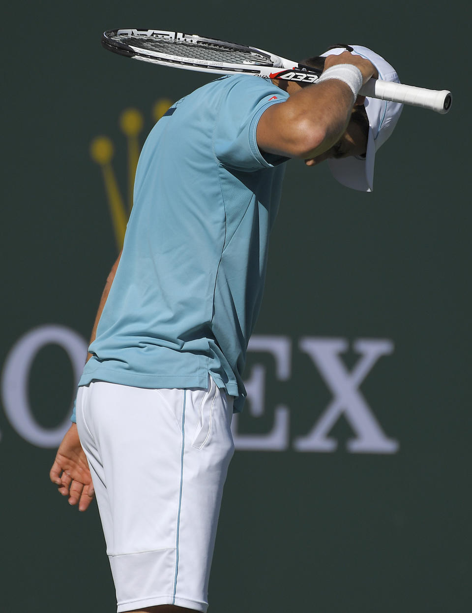 Novak Djokovic, of Serbia, reacts after losing a point to Nick Kyrgios, of Australia, at the BNP Paribas Open tennis tournament, Wednesday, March 15, 2017, in Indian Wells, Calif. (AP Photo/Mark J. Terrill)