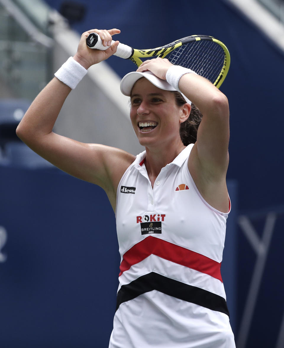 Johanna Konta, of the United Kingdom, reacts after defeating Karolina Pliskova, of the Czech Republic, during round four of the US Open tennis championships Sunday, Sept. 1, 2019, in New York. (AP Photo/Kevin Hagen)