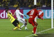 Football Soccer - Borussia Dortmund v Real Madrid - UEFA Champions League group stage - Group F - Signal Iduna Park stadium, Dortmund, Germany - 27/09/16 - Real Madrid's Raphael Varane scores a goal REUTERS/Kai Pfaffenbach