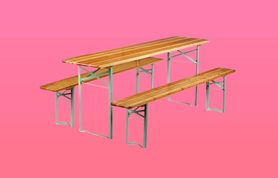 Foldable picnic table and two benches with wood tops and green metal bases. 