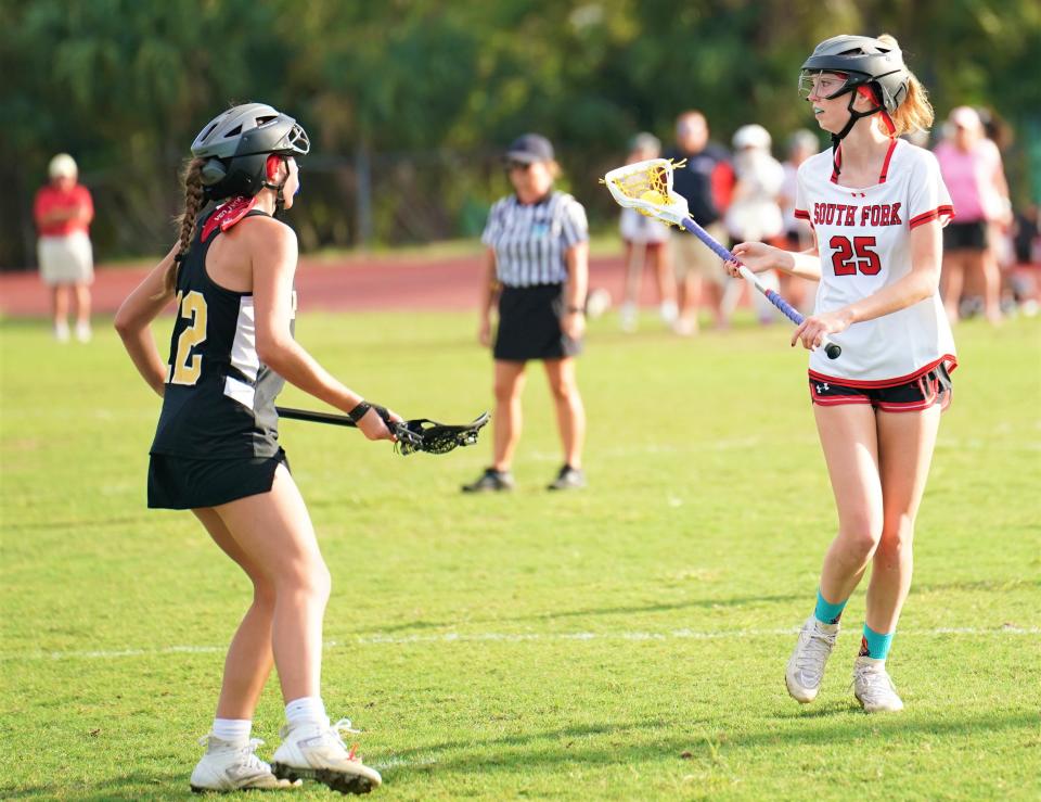 South Fork's Zoe Williams controls the ball during a Region 4-1A quarterfinal against American Heritage on Thursday, April 20, 2023 in Stuart. The Patriots won the game 10-4.
