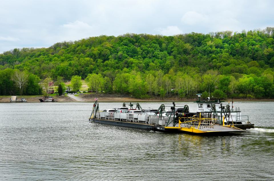 Aubrey Hess captains the Anderson Ferry toward Hebron. The Anderson Ferry has been in operation between Hebron and Delhi Township since March 3, 1817. It is listed on the National Register of Historic Places. The ferry runs daily, unless inclement weather causes it to close.