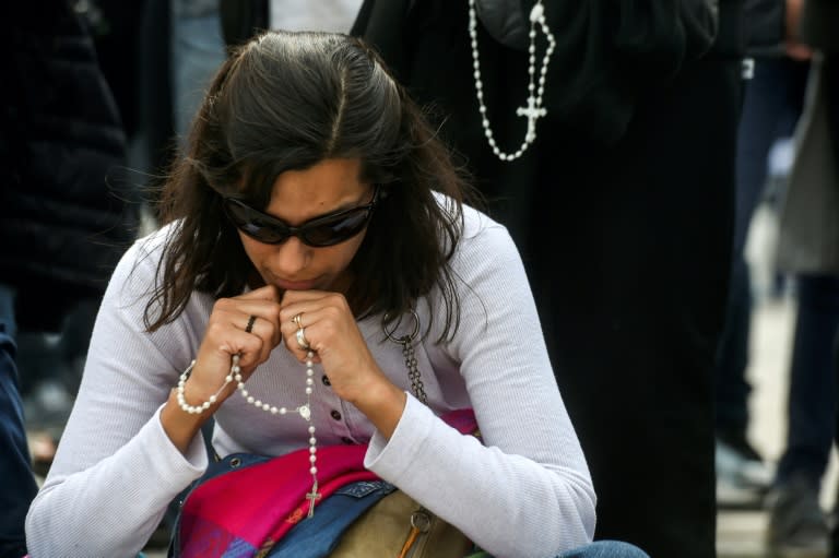 People pray outside Argentina's Navy base in Mar del Plata, on the Atlantic coast south of Buenos Aires, on November 22, 2017