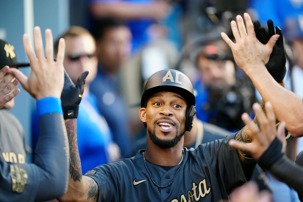 Byron Buxton of the Minnesota Twins is greeted is greeted in the dugout after hitting a solo home in the fourth inning during the MLB All-Star Game at Dodger Stadium on Tuesday, July 19, 2022 in Los Angeles. (Photo by Daniel Shirey/MLB Photos via Getty Images)