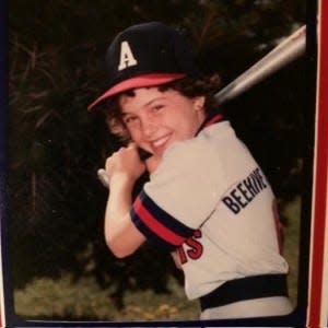 Christina Whitlock as a little league baseball player at age 8.