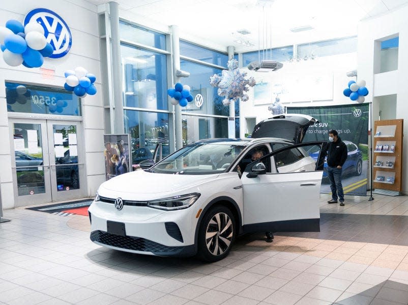 A Volkswagen ID.4 electric car on display at a VW dealership