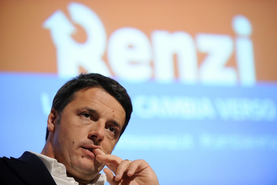 Florence mayor Matteo Renzi looks on during a political meeting in Turin