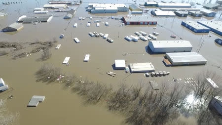 Buildings are submereged in floodwater in Bellevue, Nebraska, U.S., March 20, 2019, in this still imgage taken from social media. Bellevue (Nebraska) Police Department via REUTERS