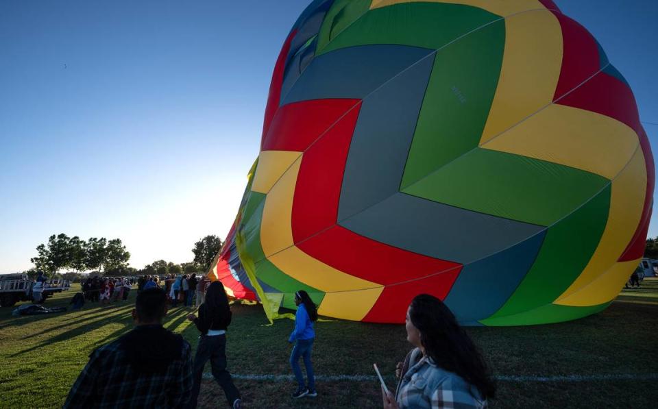 The FreeSpirit balloon is inflated during the Skies the Limit Ceres Balloon Festival at River Bluff Regional Park In Ceres, Calif., Saturday, June 15, 2024.