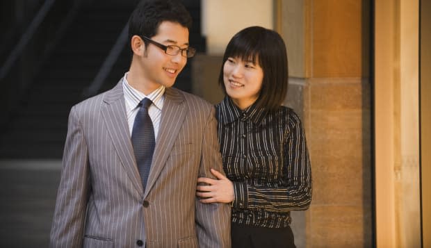 Korean couple window shopping