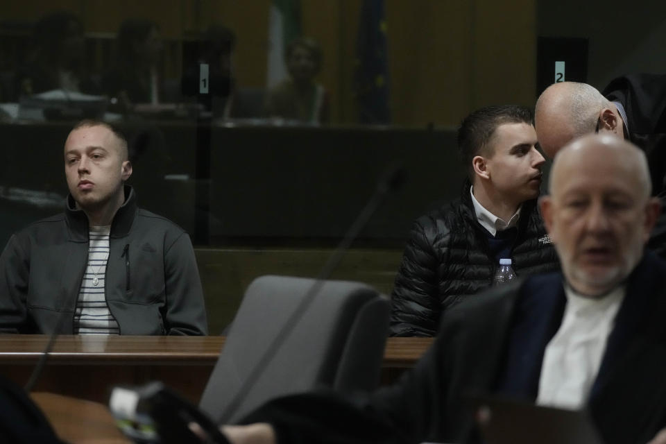 Gabriel Natale-Hjorth, right, and Finnegan Lee Elder, attend the appeal trial for the killing of Italian policeman Mario Cerciello Rega, in Rome, Friday, March. 8, 2024. The two American men face a new trial in the slaying of an Italian plainclothes police officer during a botched sting operation after Italy's highest court threw out their convictions. (AP Photo/Gregorio Borgia)