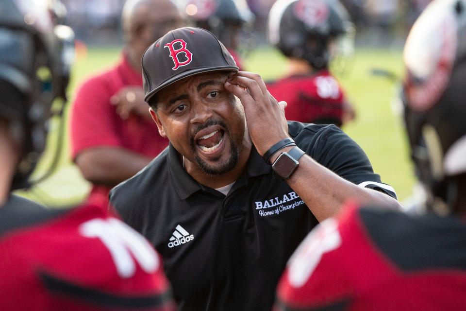 Ballard coach Adrian Morton tells his players to focus on fixing mental mistakes as No. 2 Male took on No. 4 Ballard on the Friday night gridiron at Louisville Male. August 30, 2019