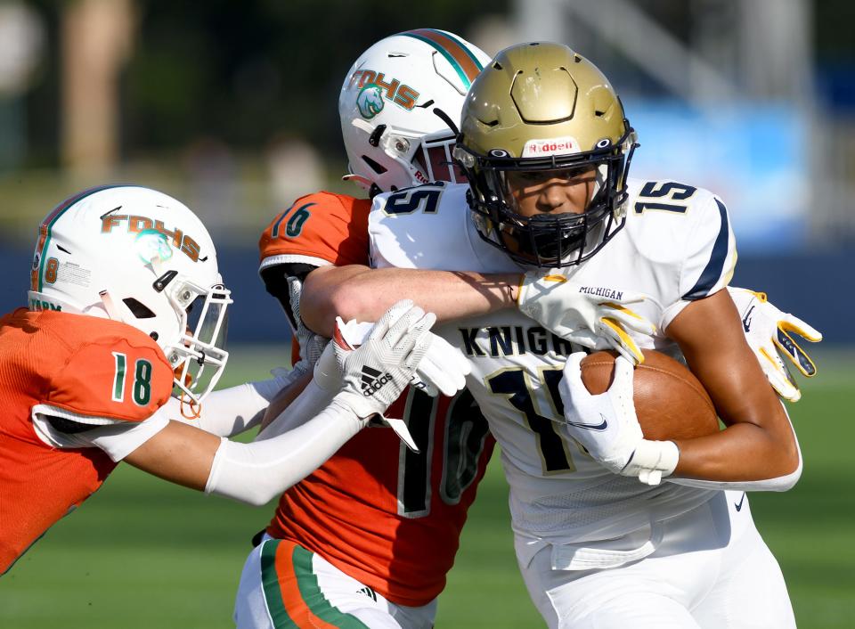 Hoban's tight end Tayte Crable runs for a first down in the third quarter vs. Frederick Douglass, Saturday, Aug. 19, 2023, in Canton.