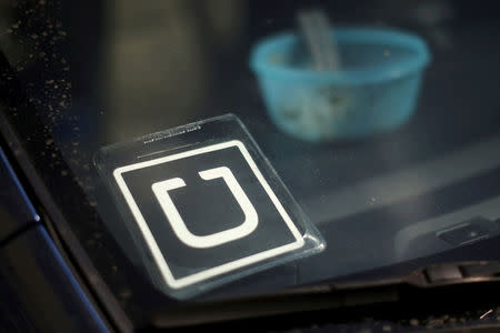 FILE PHOTO - An Uber car is seen parked with the driver's lunch left on the dashboard in Venice, California, United States on July 15, 2015. REUTERS/Lucy Nicholson/File Photo