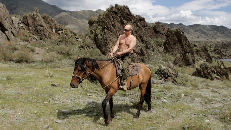 Vladimir Putin pictured riding a horse shirtless in August 2009. - Alexey Druzhinin/Ria-Novosti/AFP/Getty Images