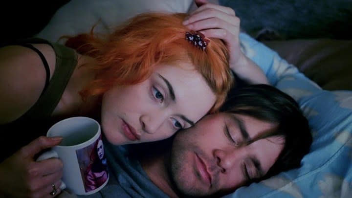 Kate Winslet and Jim Carrey as Clementine and Joel in bed together in Eternal Sunshine of the Spotless Mind.
