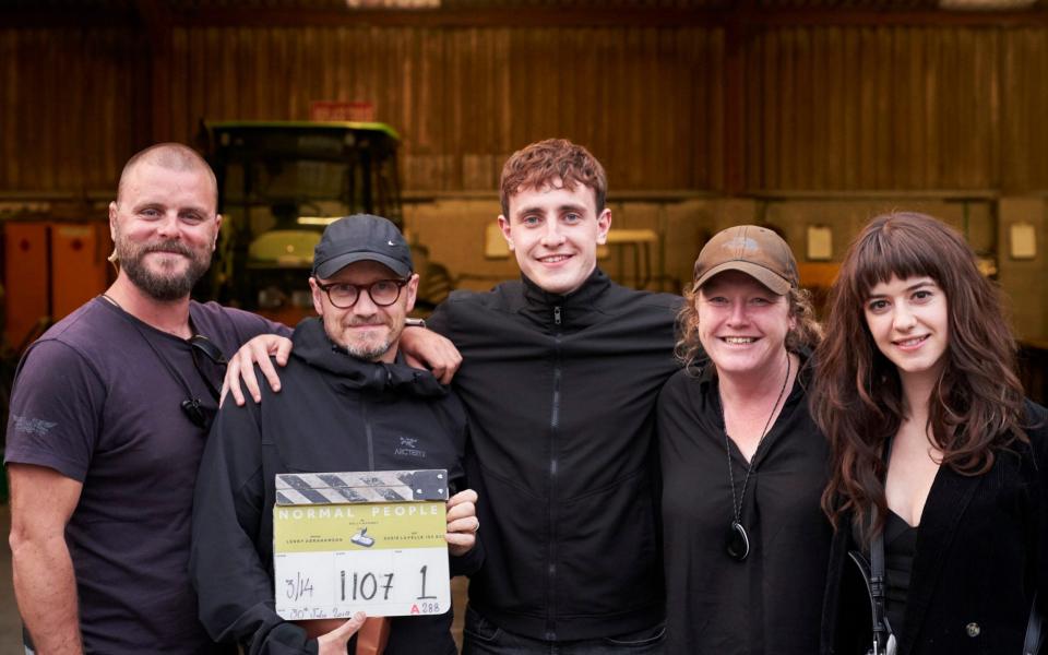 Abrahamson (second left) with the cast on set - BBC