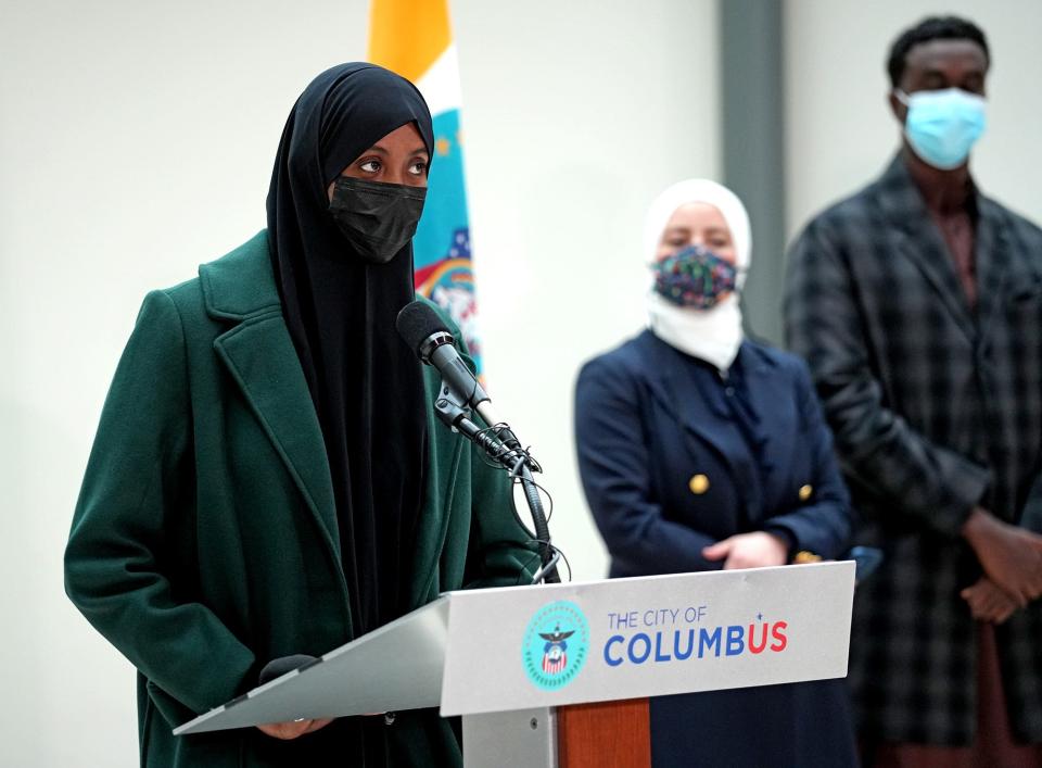 Shukri Hassan, daughter of slain Imam Mohamed Hassan Adam, speaks Friday at a news conference at Columbus City Hall, where police formally announced a Franklinton man has been charged in murder.