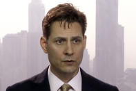 FILE - In this file image made from a March 28, 2018, video, Michael Kovrig, an adviser with the International Crisis Group, a Brussels-based non-governmental organization, speaks during an interview in Hong Kong. Two Canadians detained in China on spying charges have been released from prison and flown out of the country, Prime Minister Justin Trudeau announced Friday, Sept. 24, 2021, hours after a top executive of Chinese communications giant Huawei Technologies resolved criminal charges against her in a deal with the U.S. Justice Department. (AP Photo/File)