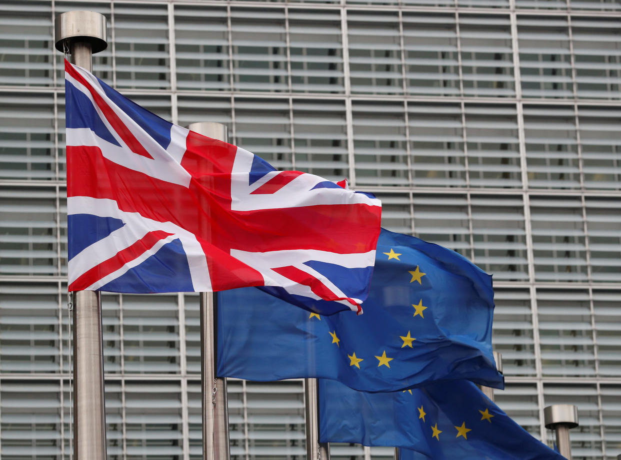 British and EU flags flying outside the Commission headquarters in Brussels (Reuters)