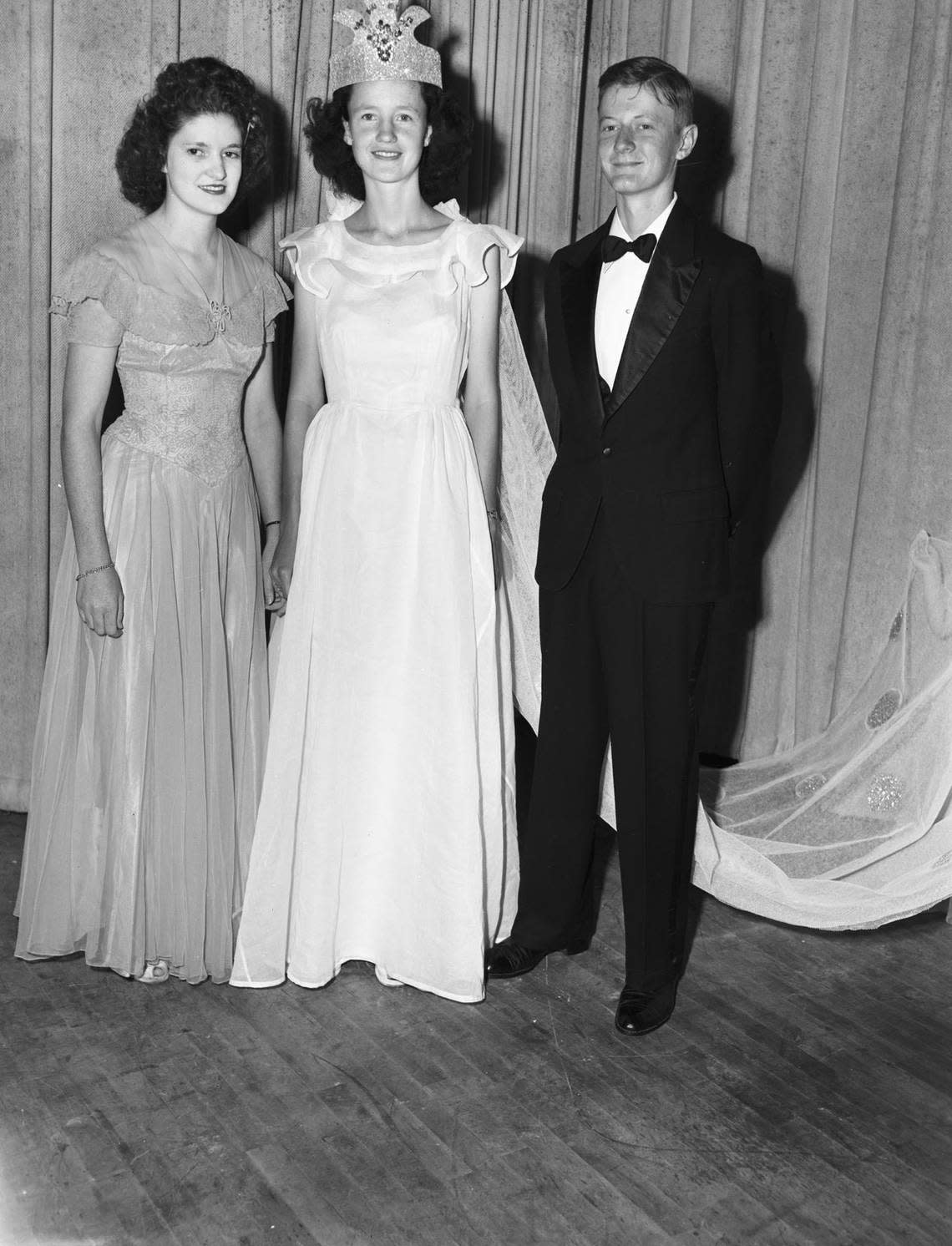 May 3, 1946: Evelyn Owens was crowned queen at the May Fete at Keller School. Her lady-in-waiting was Mary Sheehey, left, and the prime minister was Don L. Biles Jr. Fort Worth Star-Telegram archive/UT Arlington Special Collections