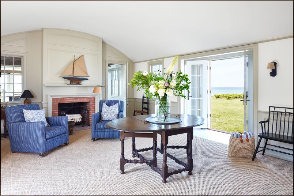 In the entry hall, a 19th-century whaling-boat model sits on the mantelpiece. Holland Macrae oval table.