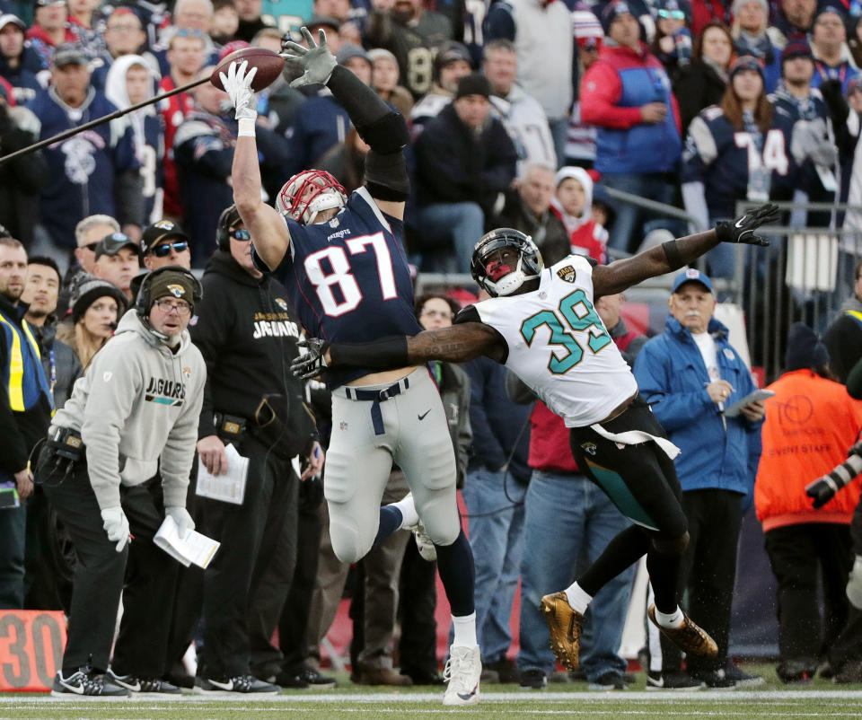 Jacksonville Jaguars safety Tashaun Gipson (39) breaks up a pass intended for New England Patriots tight end Rob Gronkowski (87) during the first half of the AFC championship game on Sunday. (AP)