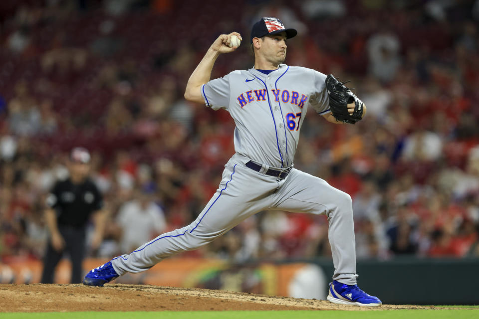 New York Mets' Seth Lugo throws during the ninth inning of a baseball game against the Cincinnati Reds in Cincinnati, Monday, July 4, 2022. (AP Photo/Aaron Doster)