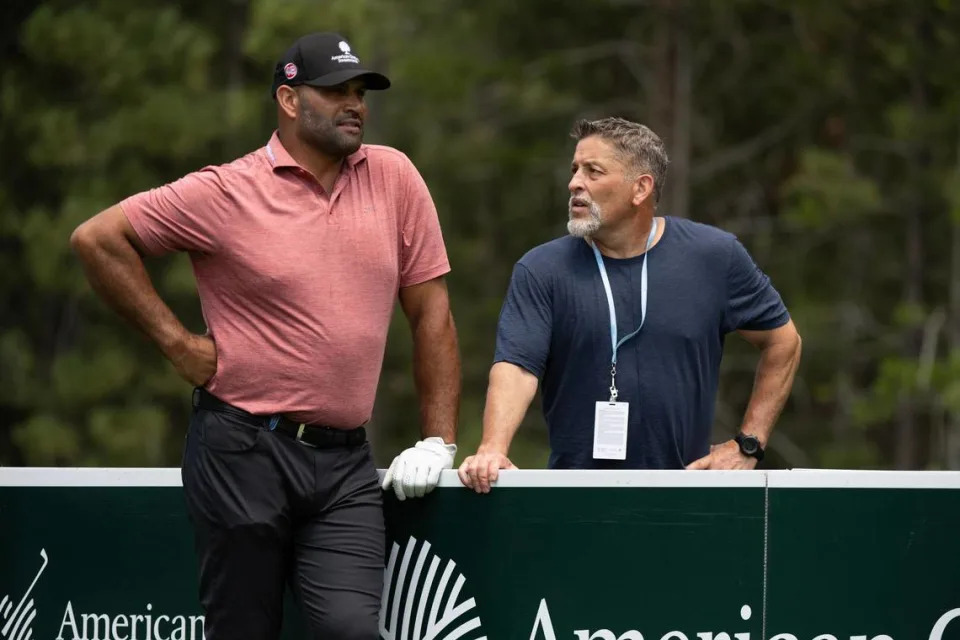 Former MLB players Albert Puljos and Fernando Viña chat at the 18th tee in the first round of the American Century celebrity golf championship on Friday, July 12, 2024, in Stateline, Nev.