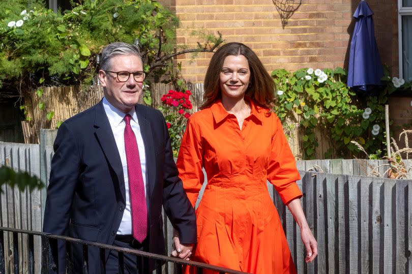 Leader of the Labour Party, Sir Keir Starmer and his wife Victoria arrive at a polling station