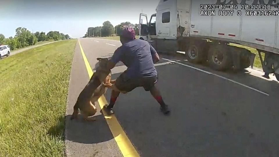 PHOTO: Police bodycam screengrab shows Jadarrius Rose being attacked by an Ohio K-9 dog on July 4, 2023, after attempting to surrender to police with his hands up following a highway chase. (Circleville Police Department)