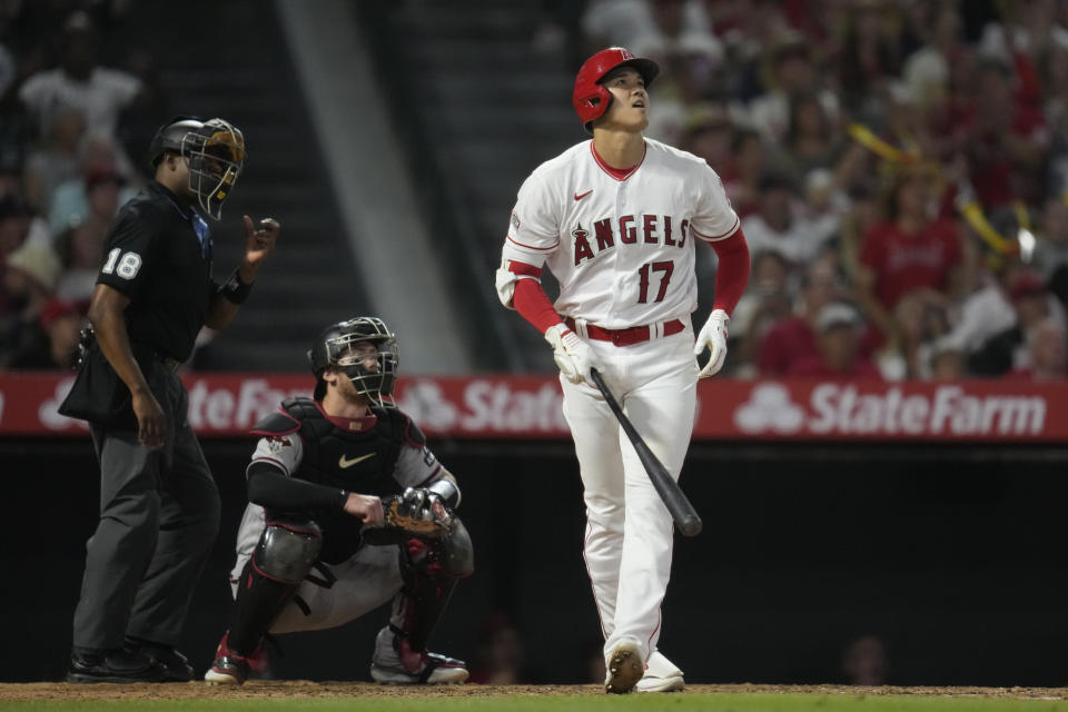 Los Angeles Angels designated hitter Shohei Ohtani (17) reacts after hitting a home run during the sixth inning of a baseball game against the Arizona Diamondbacks in Anaheim, Calif., Friday, June 30, 2023. (AP Photo/Ashley Landis)