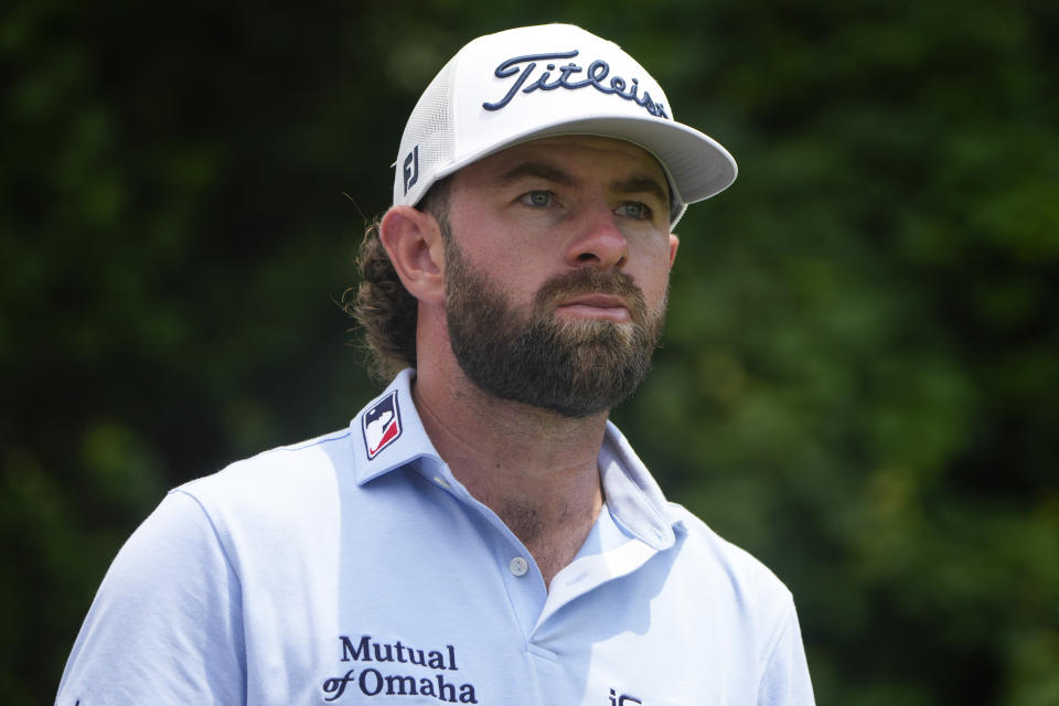 Cameron Young walks away from the 12th green during the third round of the Travelers Championship golf tournament at TPC River Highlands, Saturday, June 22, 2024, in Cromwell, Conn. (AP Photo/Seth Wenig)