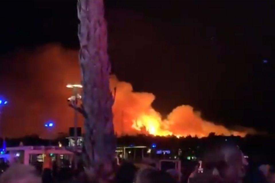 Thousands of people were forced to flee as the fire approached the festival site