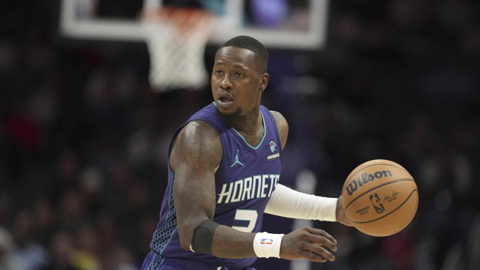 Charlotte Hornets guard Terry Rozier brings the ball down court against the San Antonio Spurs during the second half of an NBA basketball game on Friday, Jan. 19, 2024, in Charlotte, N.C. (AP Photo/Chris Carlson)
