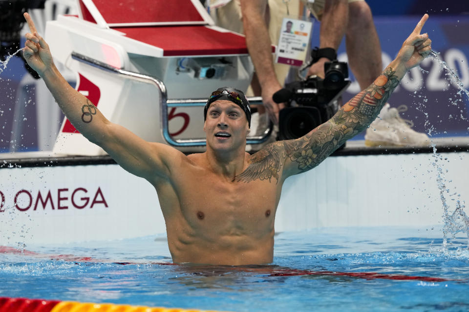 Caeleb Dressel, of the United States, celebrates after winning the men's 100-meter freestyle final at the 2020 Summer Olympics, Thursday, July 29, 2021, in Tokyo, Japan. (AP Photo/Martin Meissner)