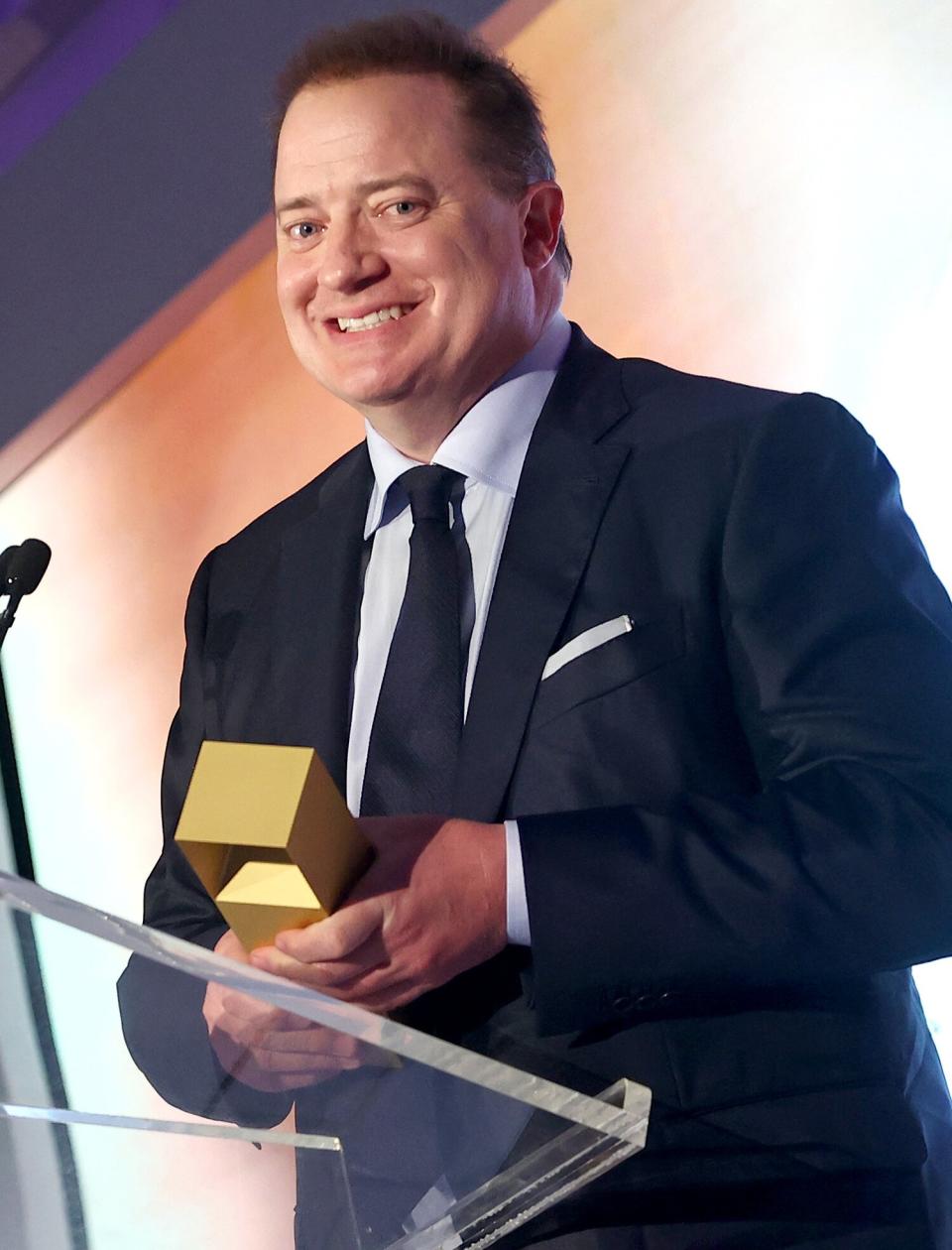 Brendan Fraser accepts the TIFF Tribute Award for Performance presented by IMDbPro for 'The Whale' onstage at the TIFF Tribute Awards Gala