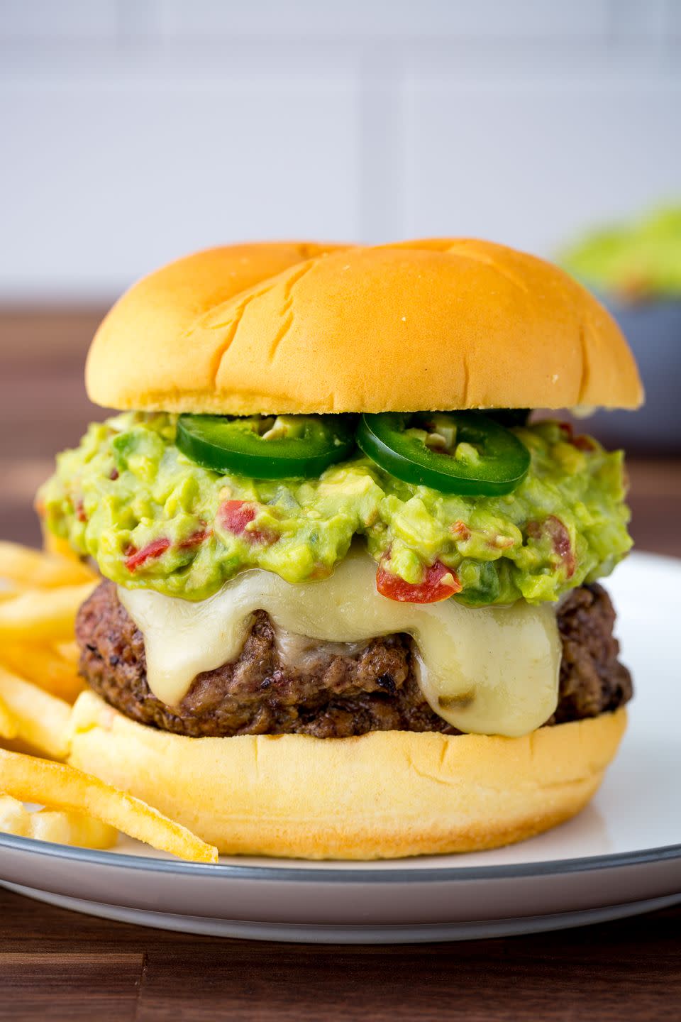 <p>Guac is a condiment gamechanger.</p><p>Get the recipe from <a href="https://www.delish.com/cooking/recipe-ideas/recipes/a47641/guacamole-burger-recipe/" rel="nofollow noopener" target="_blank" data-ylk="slk:Delish;elm:context_link;itc:0;sec:content-canvas" class="link ">Delish</a>.</p>