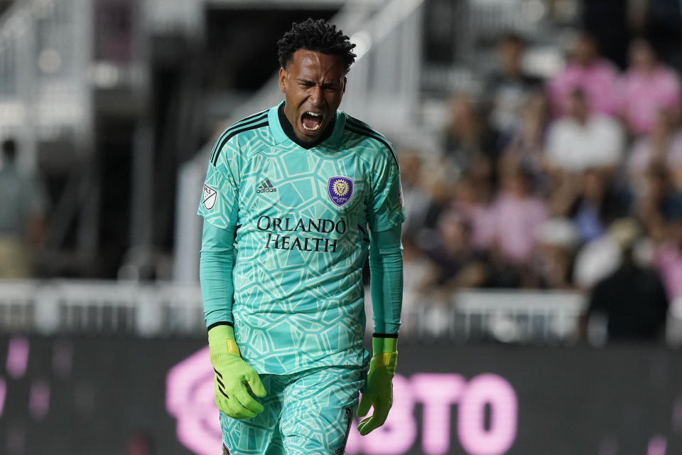 Orlando City goalkeeper Pedro Gallese (1) gestures after a collision near the goal during the first half of an MLS soccer match against the Inter Miami, Wednesday, Oct. 5, 2022, in Fort Lauderdale, Fla. (AP Photo/Marta Lavandier)