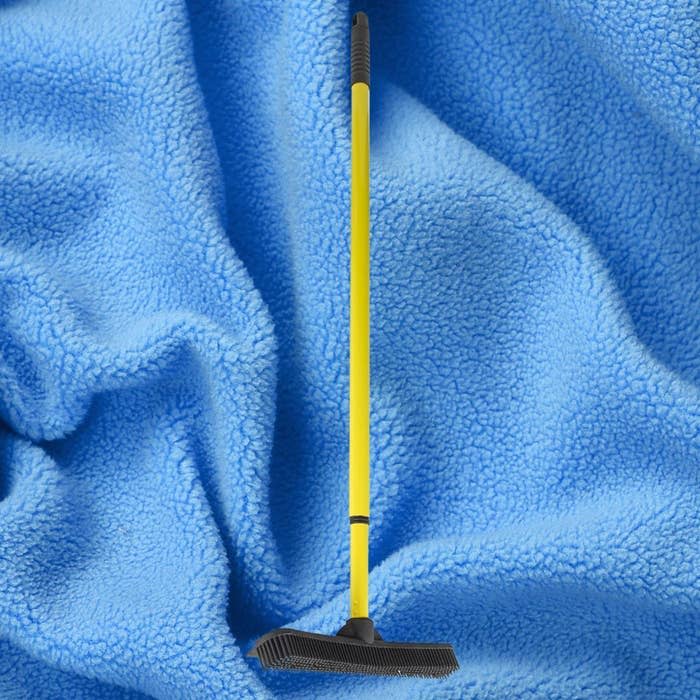 This rubberized broom with telescoping handle captures deeply embedded hair and debris from carpets and hardwood floors so well that many reviewers were shocked at how much their vacuums were leaving behind. It also features a built-in squeegee that's great for cleaning shower walls, windows and tile. Promising Amazon review: 