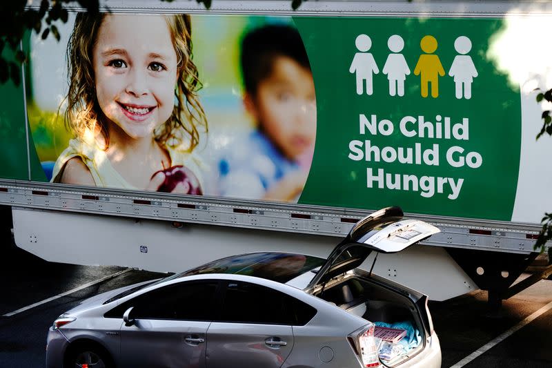 FILE PHOTO: Los Angeles Regional Food Bank drive-thru distribution in West Covina