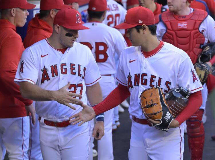 ANAHEIM, CALIFORNIA - MAY 27: Mike Trout #27 and Shohei Ohtani.