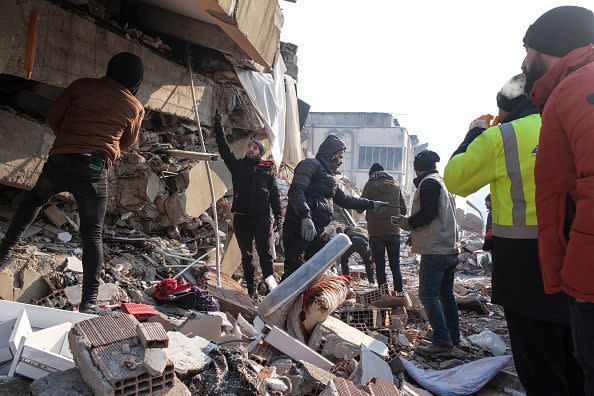 ELBISTAN, TURKEY - FEBRUARY 10: Volunteers and rescue teams work for on a ruined building on February 10, 2023 in Elbistan Turkey. A 7.8-magnitude earthquake hit near Gaziantep, Turkey, in the early hours of Monday, followed by another 7.5-magnitude tremor just after midday. The quakes caused widespread destruction in southern Turkey and northern Syria and were felt in nearby countries.  (Photo by Mehmet Kacmaz/Getty Images)