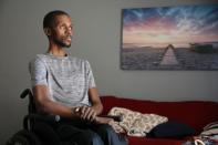 T'angelo Magee poses in his wheel chair in Hackensack, New Jersey