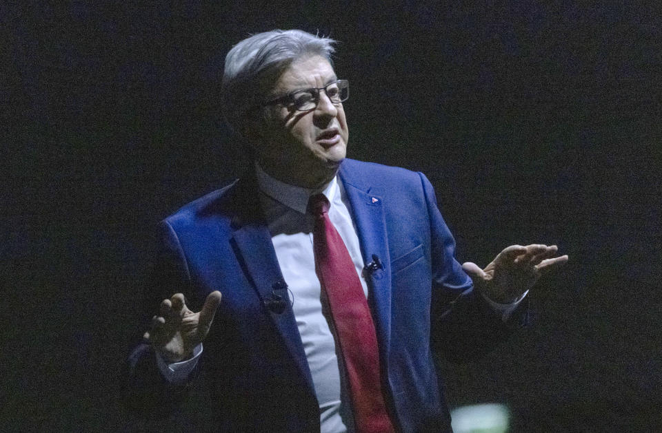 French Far-left presidential candidate for the 2022 election Jean-Luc Melenchon gestures as he speaks during a meeting in Nantes, western France, Sunday, Jan. 16, 2022. Far-left French presidential candidate Jean-Luc Melenchon sought Sunday to reinvigorate his flagging campaign for April's election with an "immersive and olfactory" rally, using 360-degree video and smells diffused through an exhibition hall in the western city of Nantes. (AP Photo/Jeremias Gonzalez)