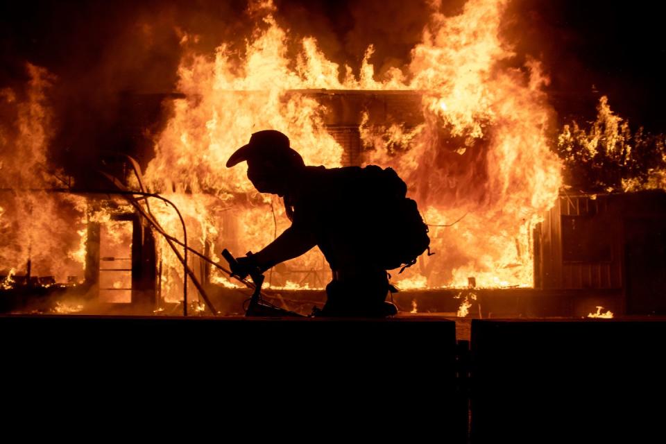 <p>A building was set on fire during rioting near the Minneapolis Police Department’s Fifth Precinct building. </p>